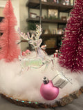 ￼Pink Reindeer Winter Scene